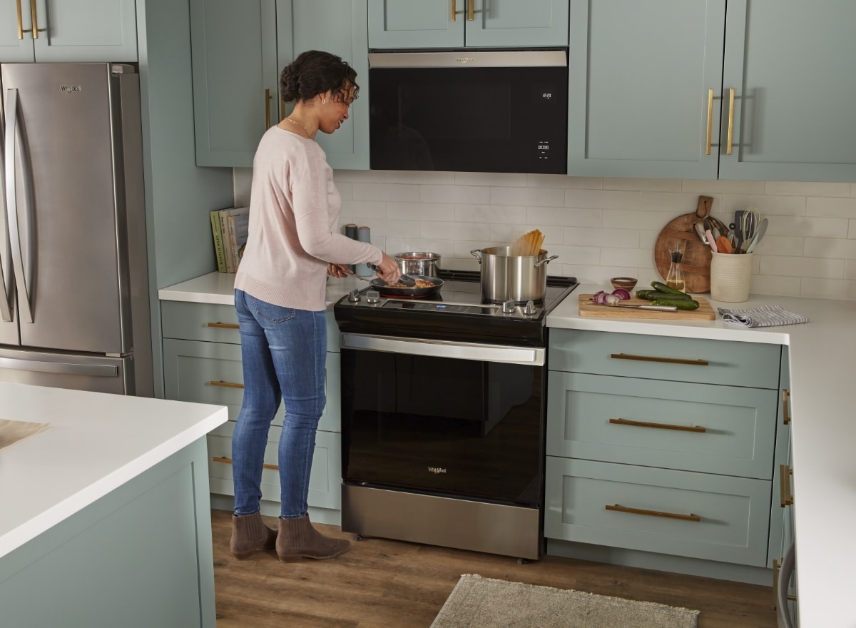 Person cooking in kitchen