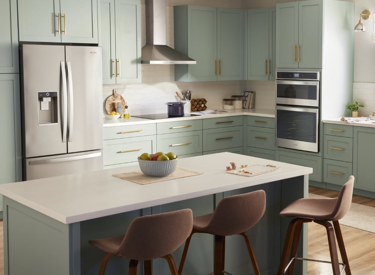 Kitchen with green cabinets