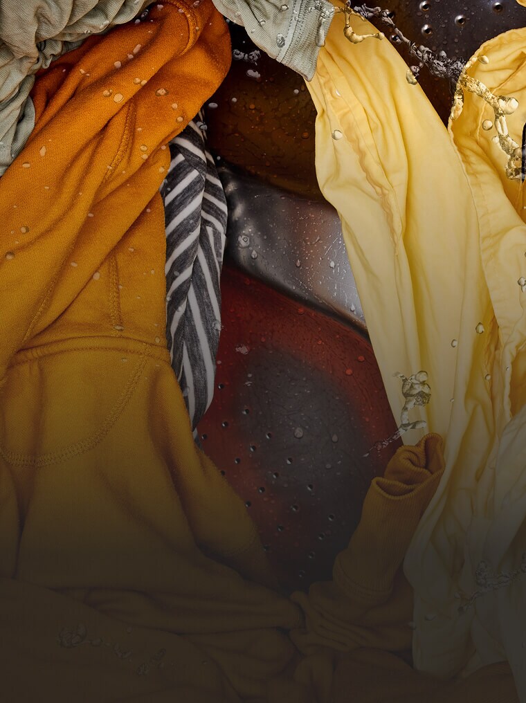 Close-up of clothes agitating in a washer