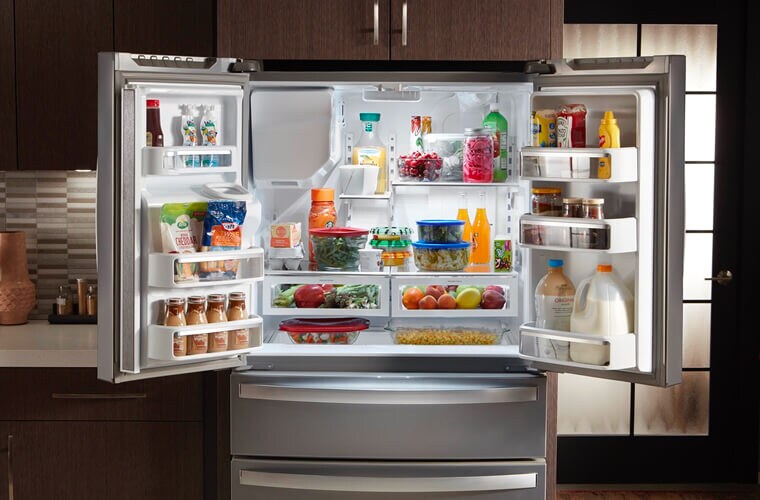 Open and fully stocked Whirlpool® French Door Refrigerator