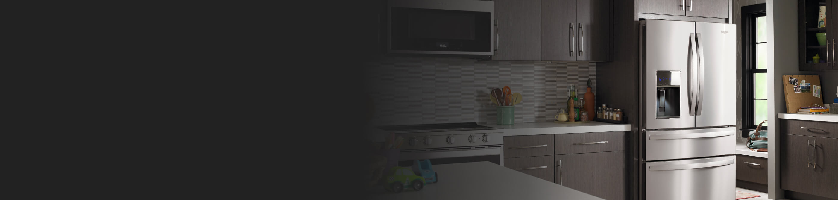 Stainless steel Whirlpool® French Door Refrigerator in brown cabinetry