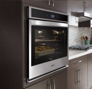  A stainless steel wall oven installed at counter height