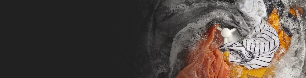 Clothes washing in a Whirlpool® Top Load Washer with Agitator