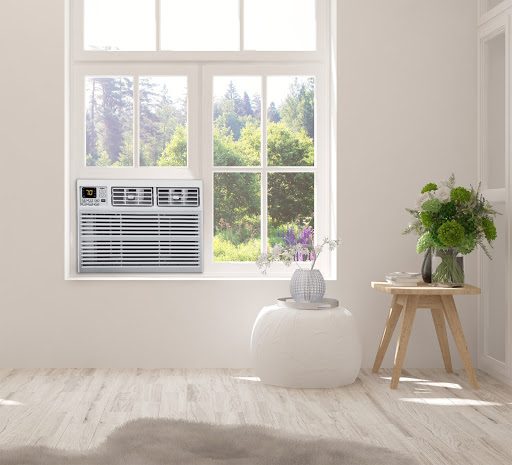 A Whirlpool window air conditioner in a living room