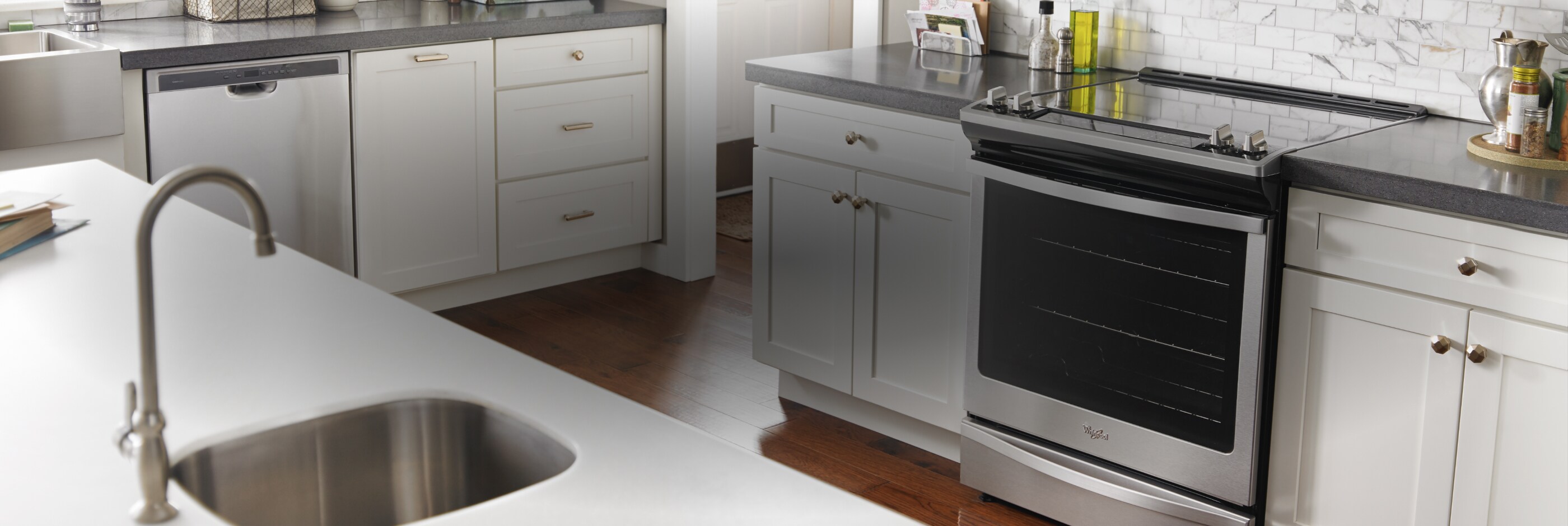 A kitchen with a Whirlpool® range.