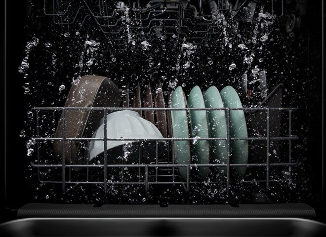 Dishes washing inside a Whirlpool® Dishwasher with the Boost Cycle