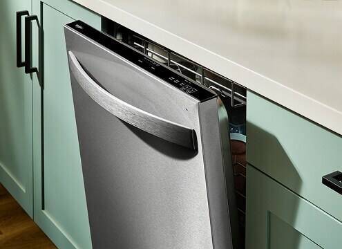 A Whirlpool® Dishwasher with the door slightly open, showing Auto Open Air Dry
