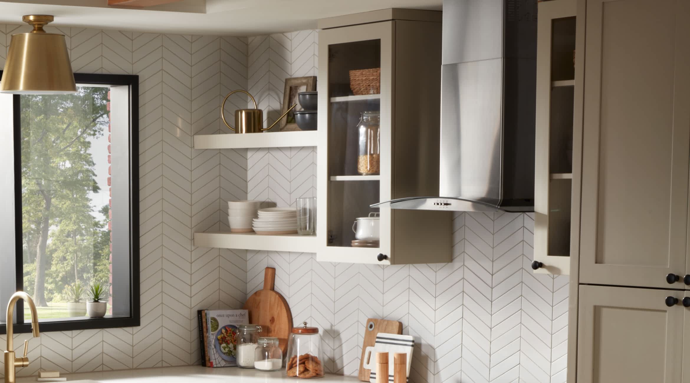 A modern kitchen with a Whirlpool® Canopy Hood