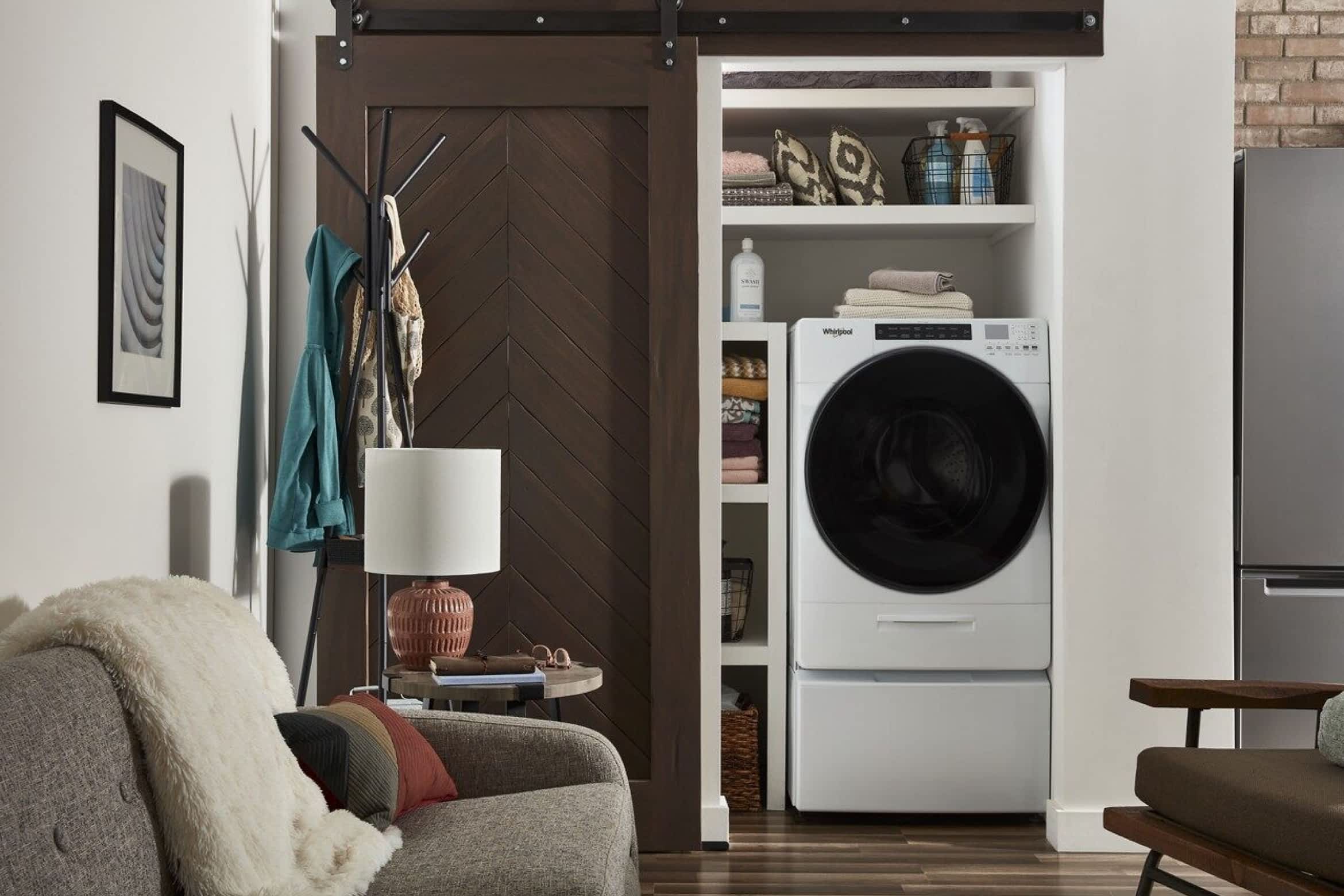 A Whirlpool® All-In-One Washer on a Whirlpool® Laundry Pedestal