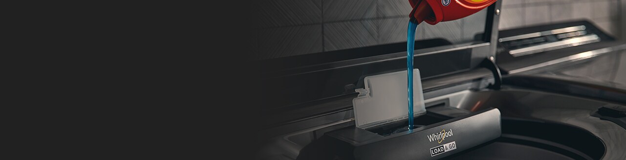 Detergent pouring into the Whirlpool® Load & Go™ Dispenser