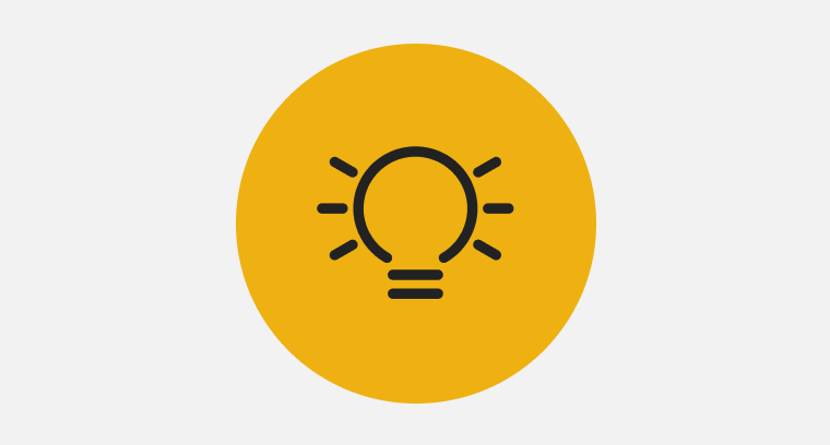 Icon of a lit up lightbulb.