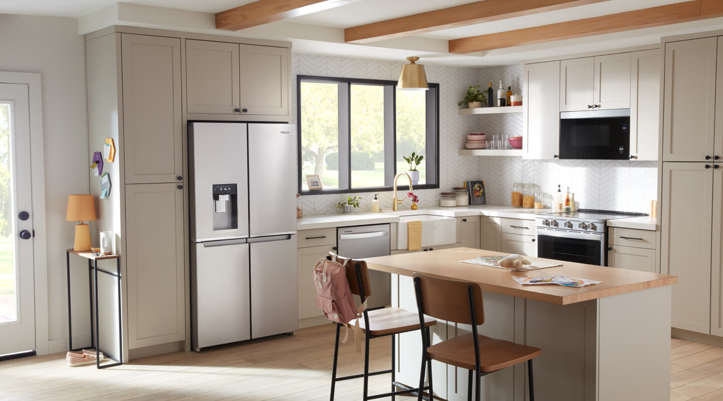 Modern kitchen with a stainless steel Whirlpool® Appliance Suite