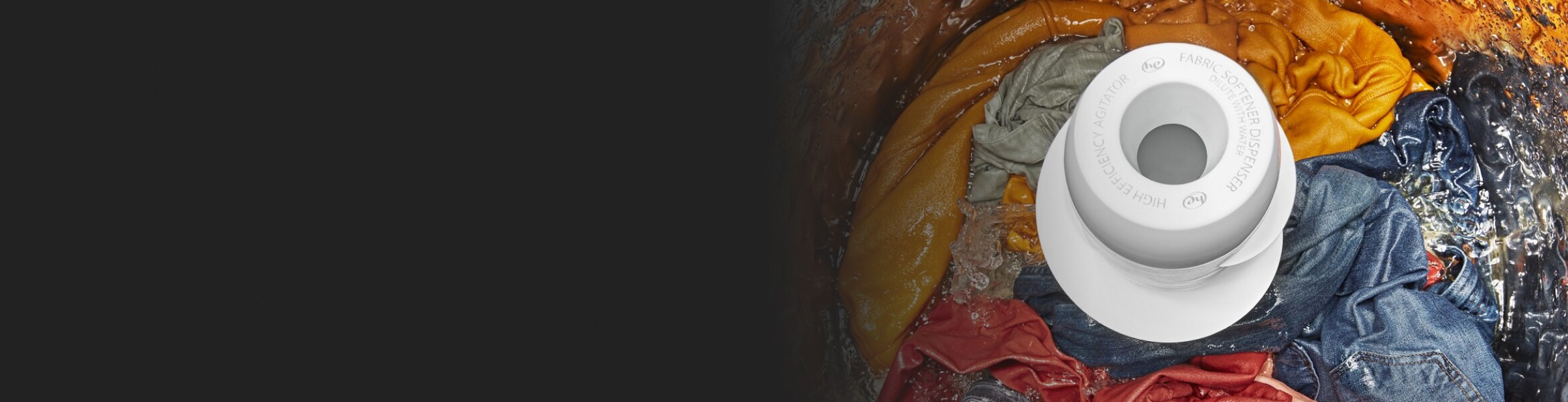 Inside view of a washing machine washing clothes