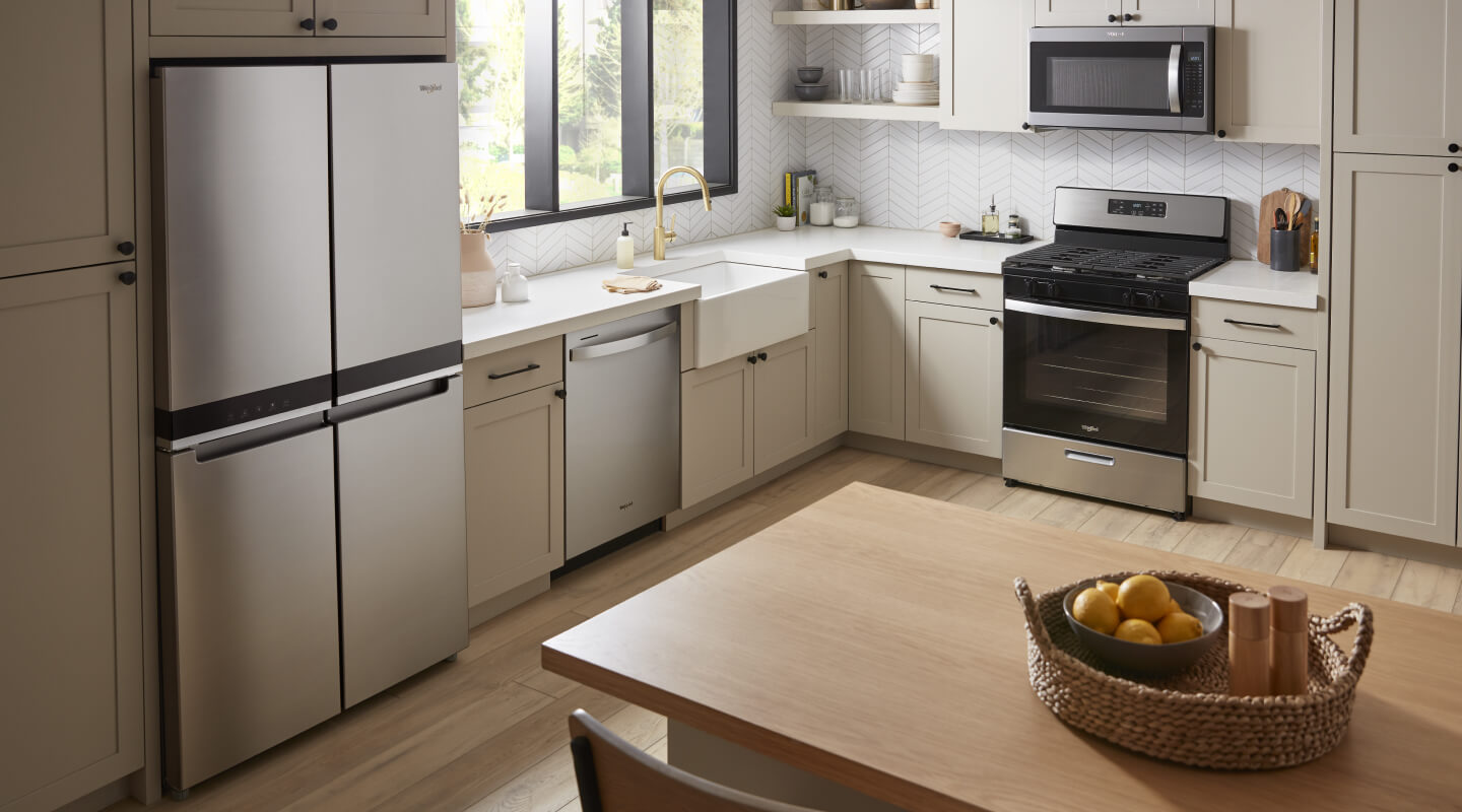 A bright kitchen with a Whirlpool® 4-Door Refrigerator