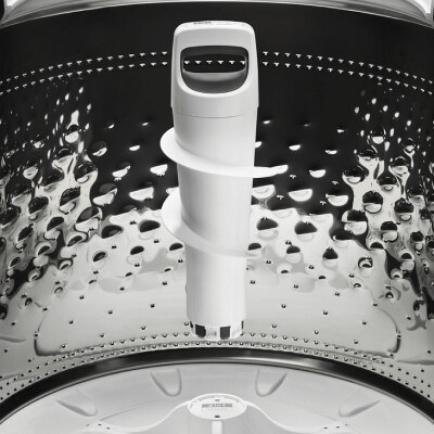 An agitator inside a washer drum