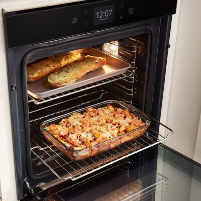 Bread and pasta in an oven