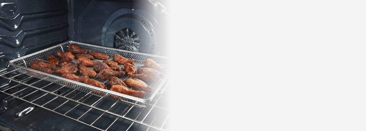 Chicken wings inside an oven