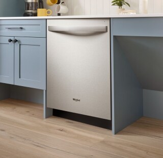 Whirlpool® Top Control Dishwasher in a blue kitchen