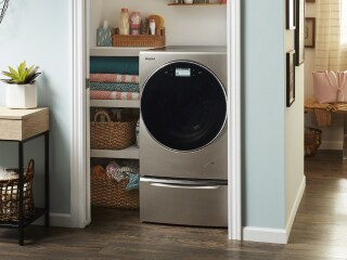 All-in-one washer dryer combo in a small laundry room