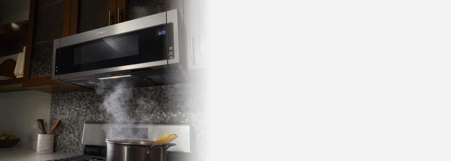 Low prifile microwave above a kitchen range