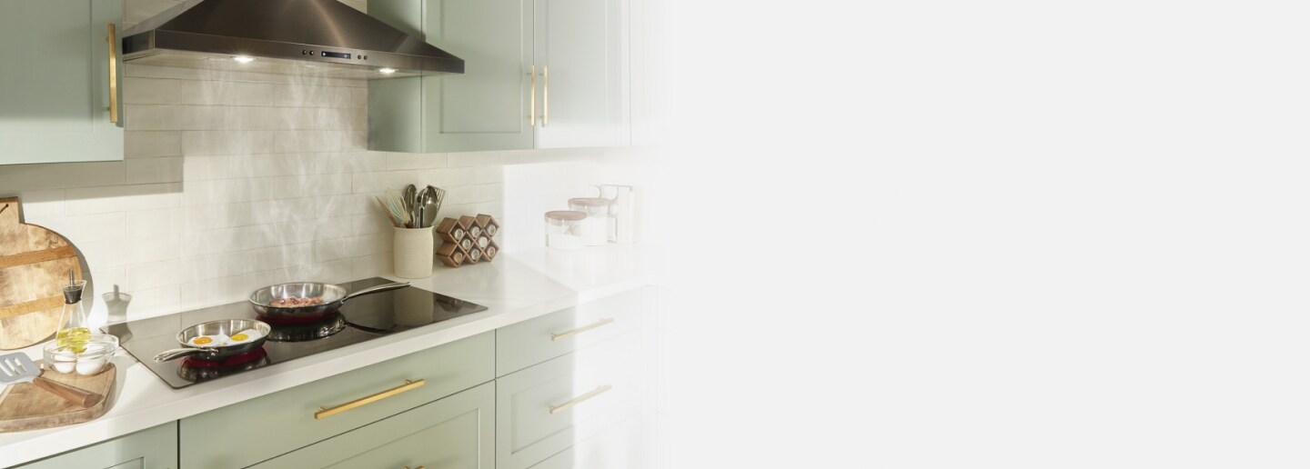 Electric cooktop under a canopy kitchen hood