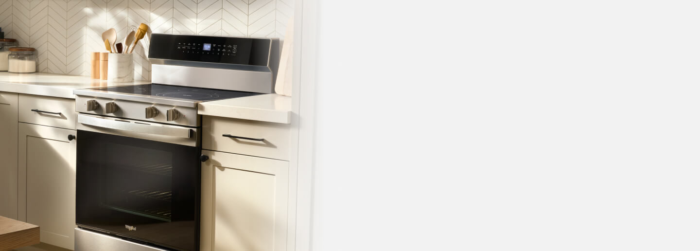 Whirlpool® Electric Range in a white kitchen
