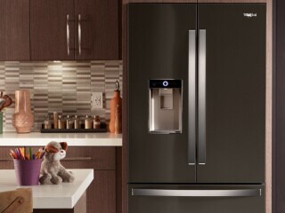 Stainless steel French door refrigerator in a modern kitchen