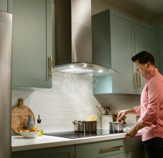 A person cooking in a kitchen