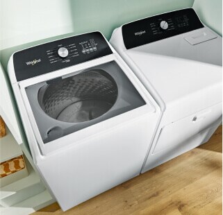 White top load washer and dryer