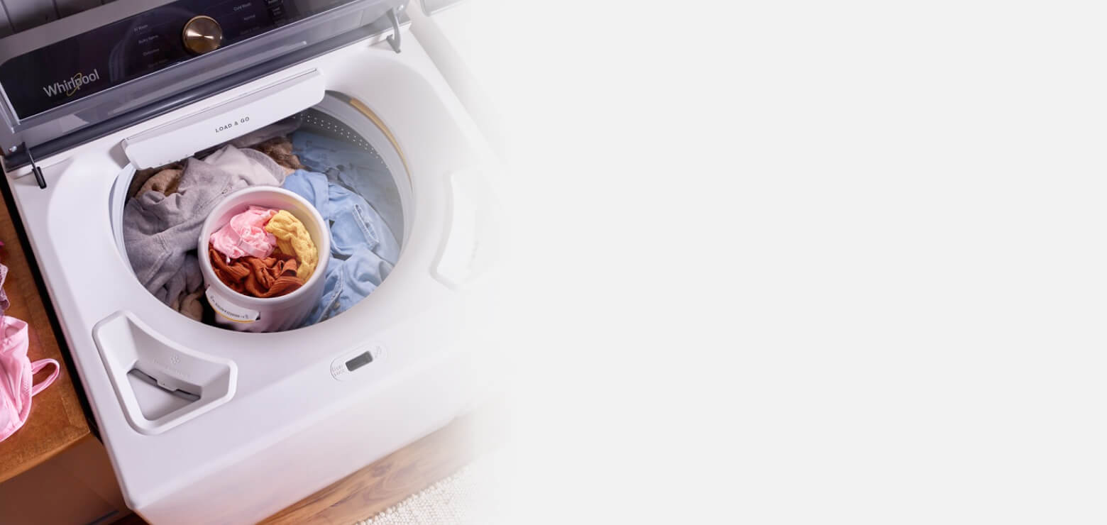 Clothes inside of the Removable Delicates Basket in a Whirlpool® Washer
