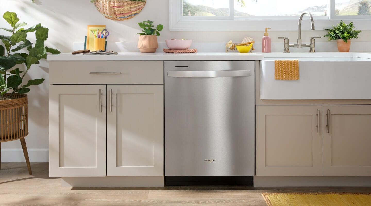 Whirlpool® Dishwasher set in light colored cabinetry