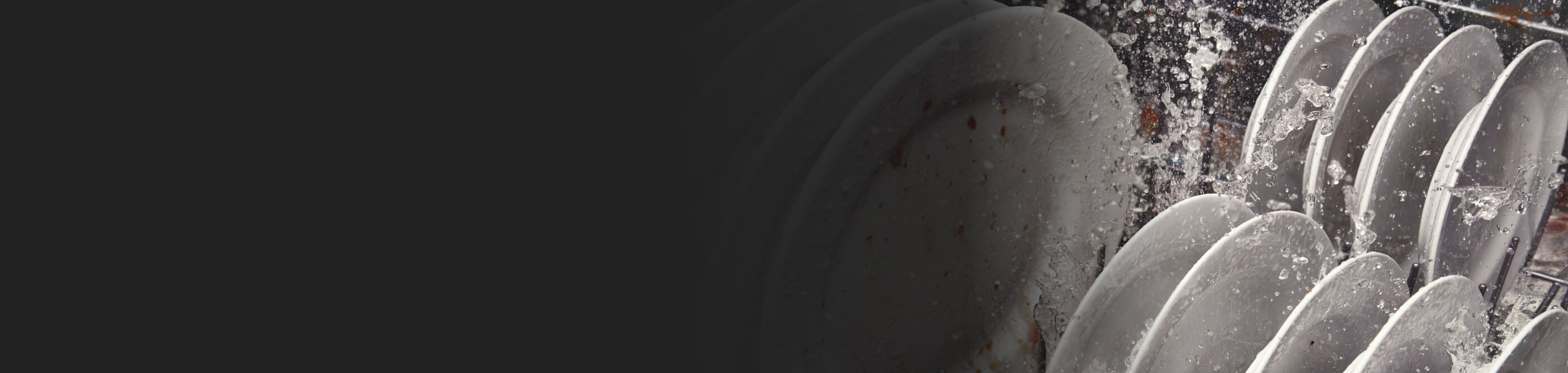 Dishes being washed in dishwasher