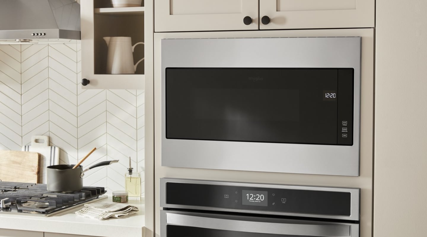 Built-in microwave in wall above built-in wall oven. Built-in microwave in wall above built-in wall oven.