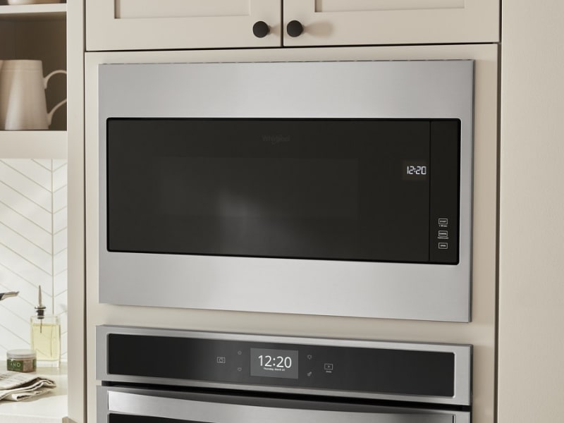 Built-in microwave in wall above built-in wall oven. Built-in microwave in wall above built-in wall oven.