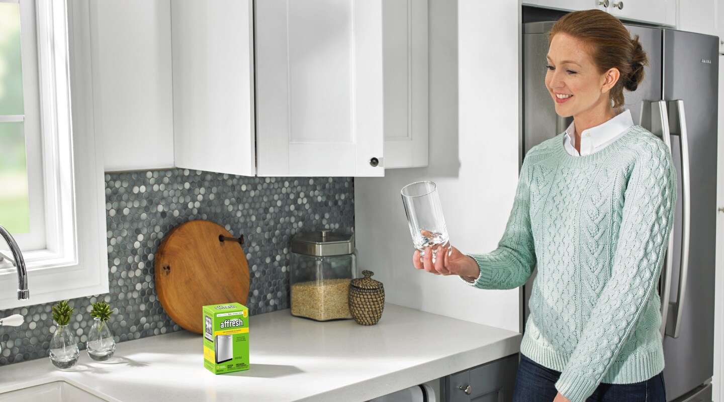 Person looking at clean glass Person looking at clean glass