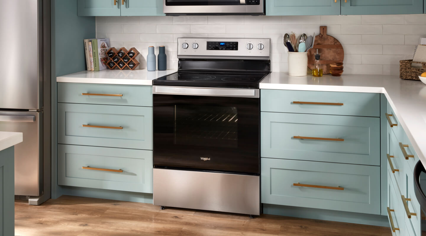 Whirlpool® Oven with Air Fry set in blue cabinetry