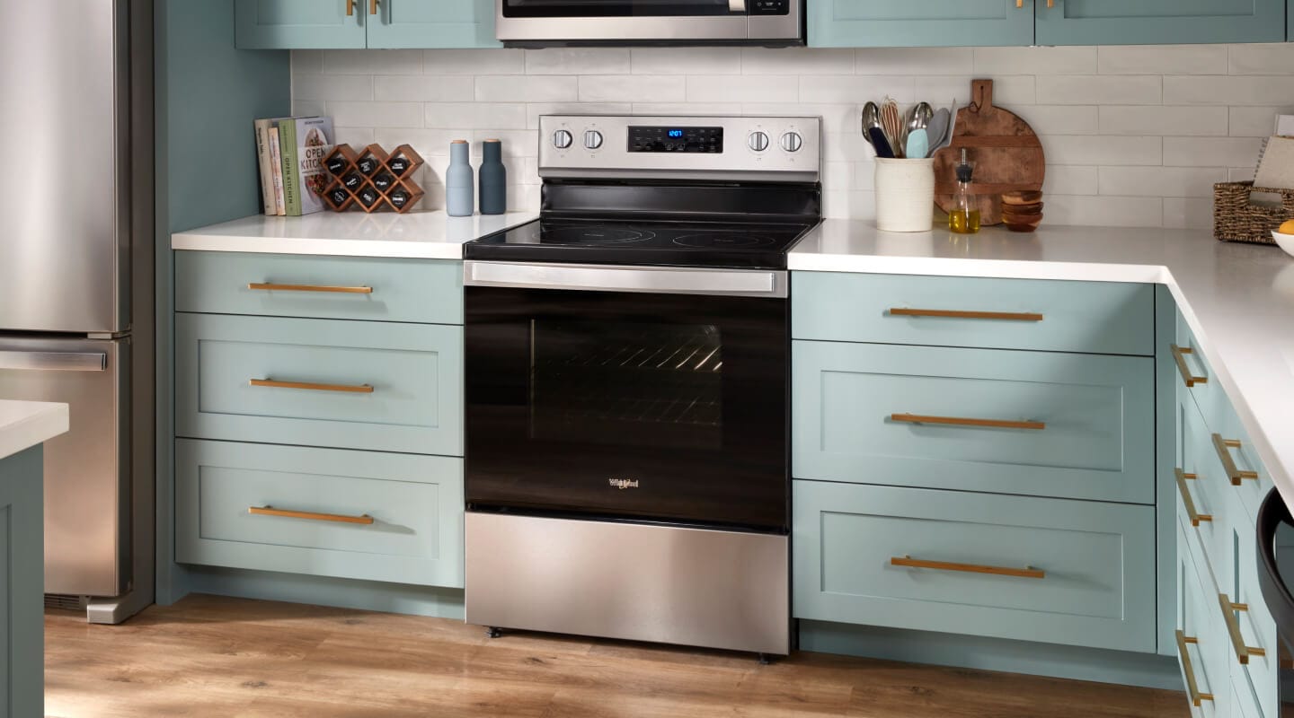Whirlpool® Oven with Air Fry set in blue cabinetry