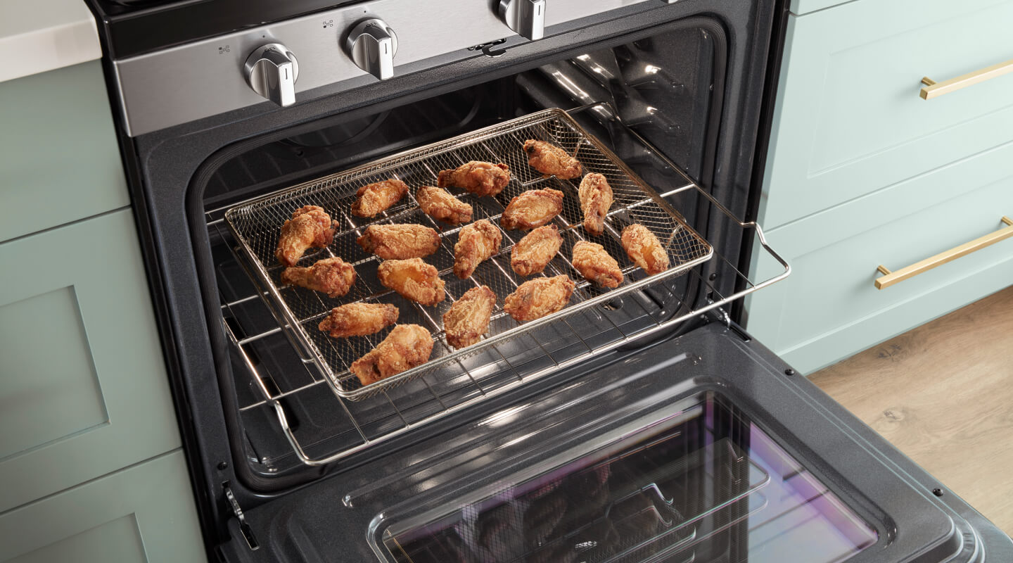 Chicken wings in an air fry basket