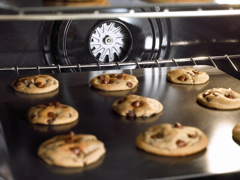 Cookies baking in an oven with air fry setting Cookies baking in an oven with air fry setting