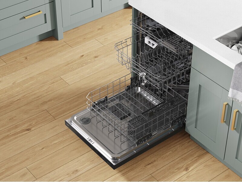 An open and emptied Whirlpool® Dishwasher