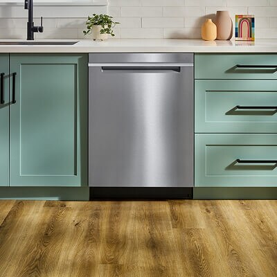 A Whirlpool® Stainless Steel Dishwasher in a kitchen