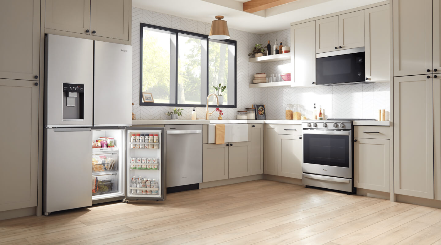 Stainless steel kitchen appliances in a bright kitchen Stainless steel kitchen appliances in a bright kitchen