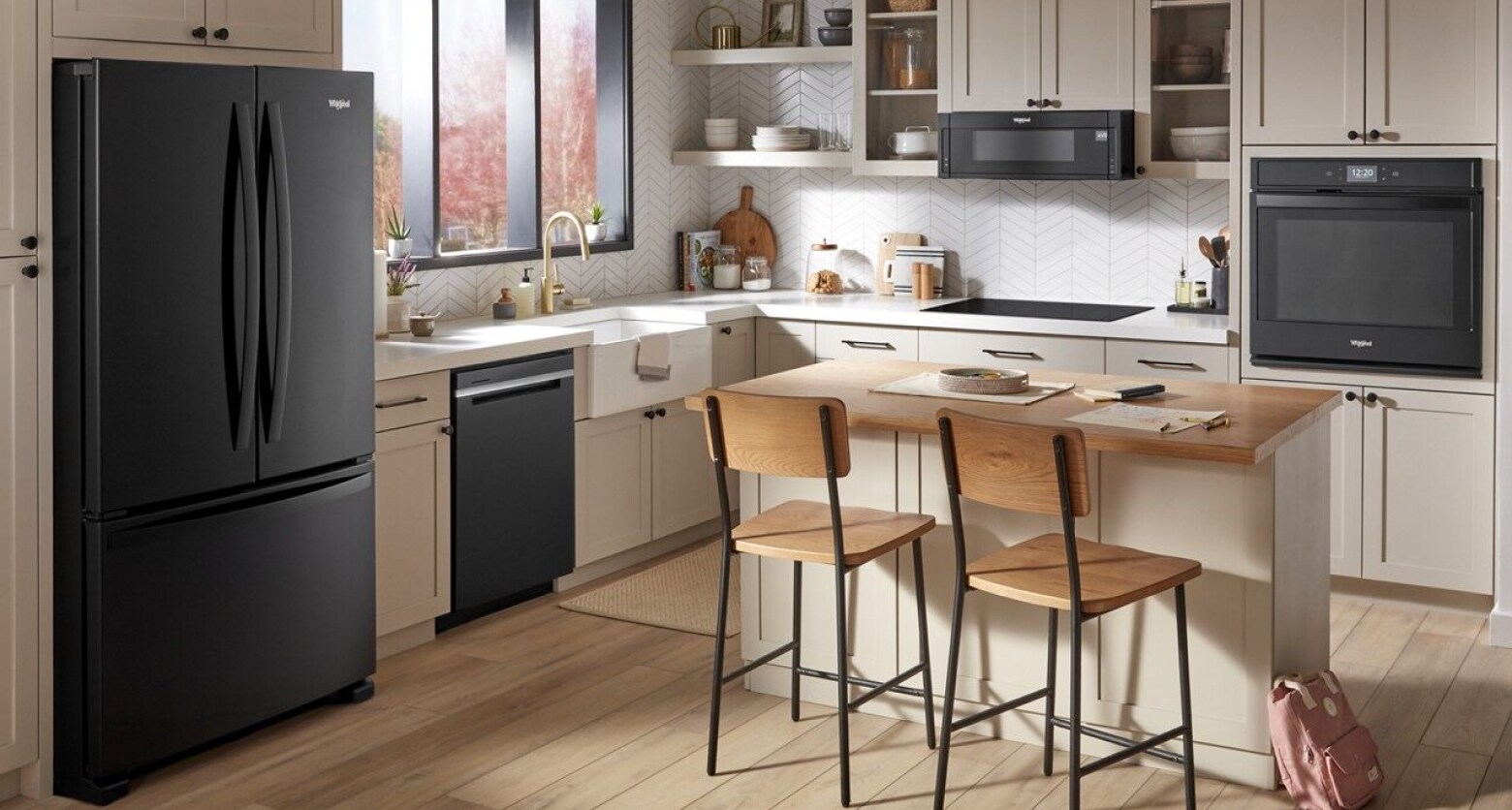 Kitchen featuring Whirlpool® appliances in black