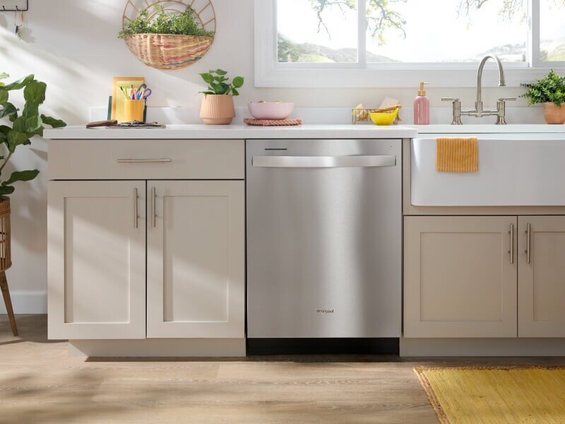 Stainless steel Whirlpool® Dishwasher in bright, modern cabinetry