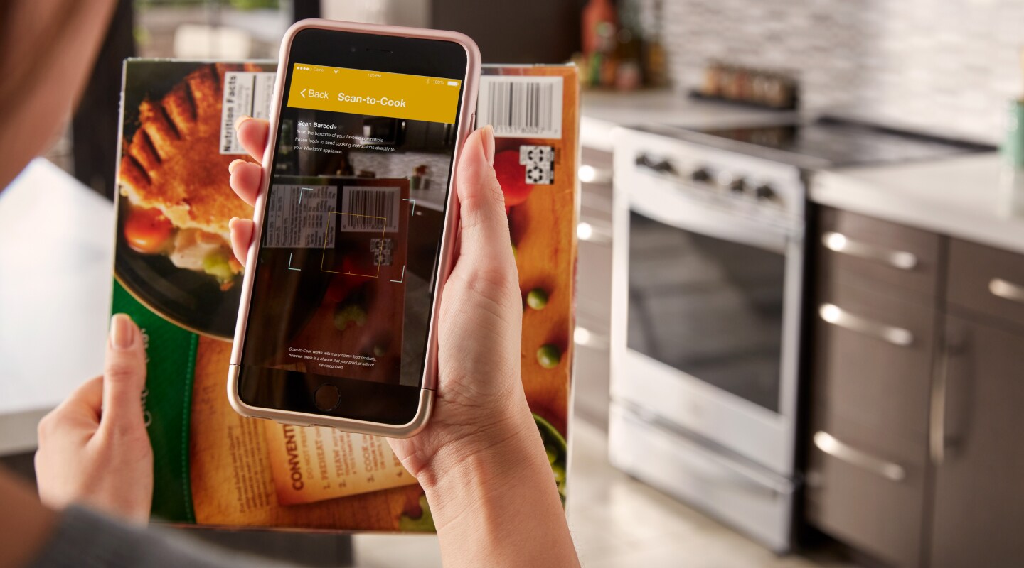 Person using the Whirlpool® App Person using the Whirlpool® App