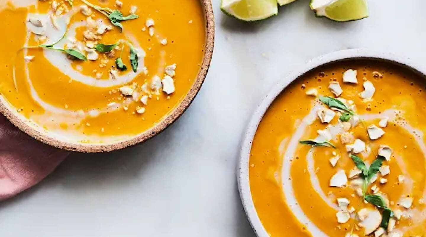 Two bowls of Coconut Curry Carrot and Sweet Potato Soup Two bowls of Coconut Curry Carrot and Sweet Potato Soup