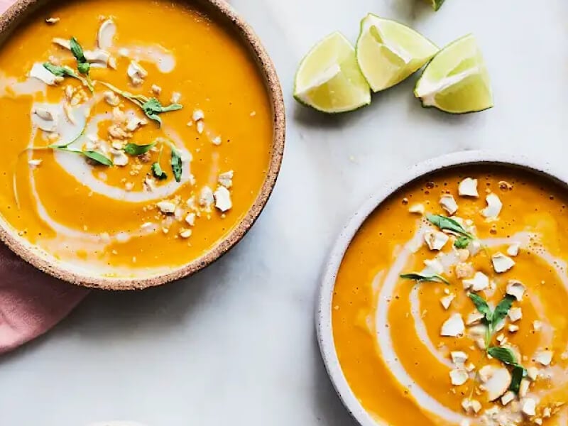 Two bowls of Coconut Curry Carrot and Sweet Potato Soup Two bowls of Coconut Curry Carrot and Sweet Potato Soup