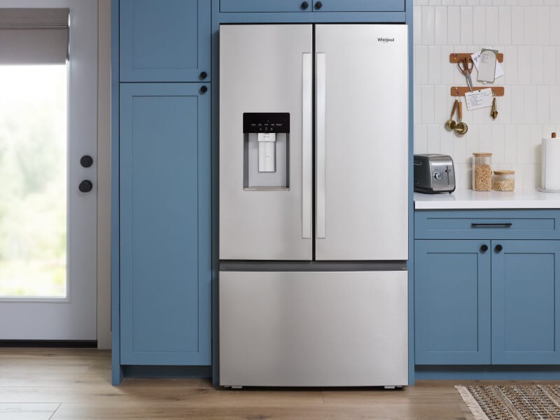 Whirlpool® French door refrigerator in blue cabinetry