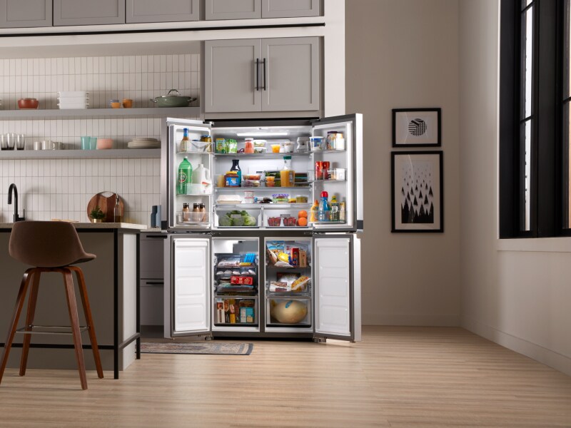 An open french door refrigerator  An open french door refrigerator