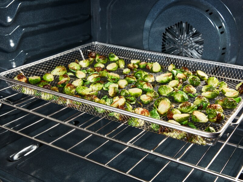 Baked brussel sprouts in an oven Baked brussel sprouts in an oven